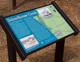 Schoolhouse Creek sign